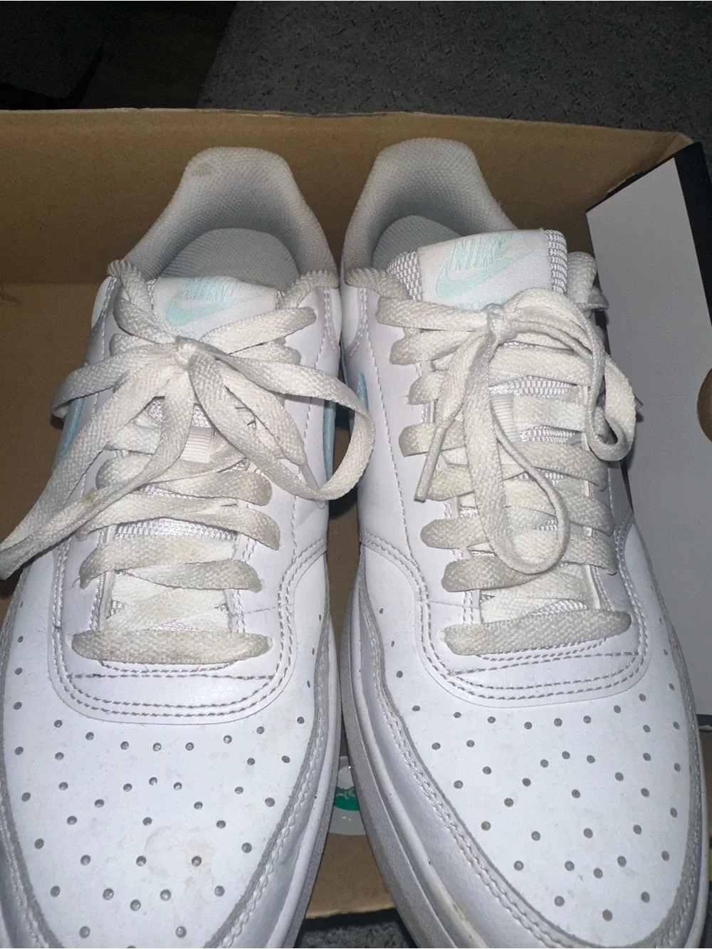Nike Women's White Sneakers with Light Blue Swoosh